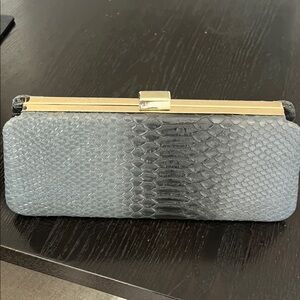 Elegant gray Snake-Embossed Clutch with Gold Frame